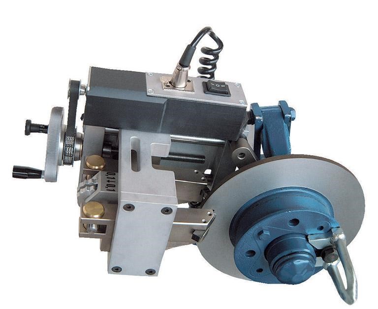 Máquina retificadora de discos ligeiros portátil